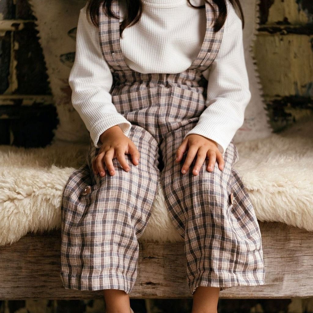 unisex childrens trousers, linen brown check with detachable brown linen check braces.  Worn with an offwhite organic jersey waffle childrens top